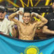 Казахстанский боец с флагом и его тренерами